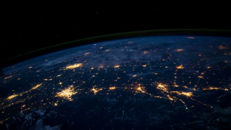 nasa blue globe earth warm network lights from space on dark background