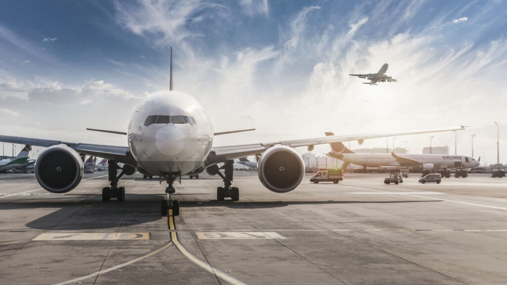 Planes on the ground on an airport runway